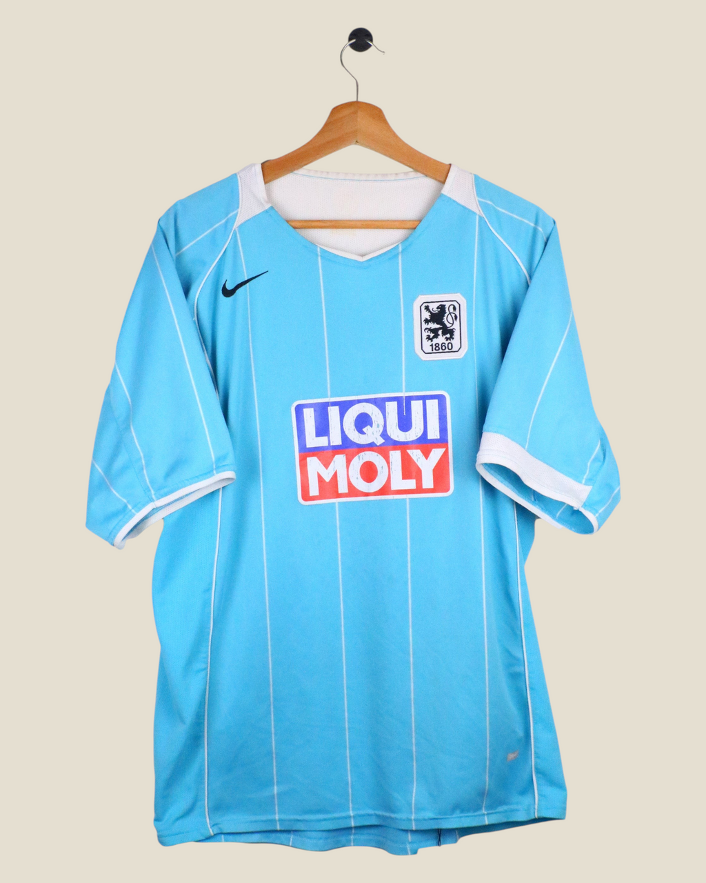 Kick Off Vintage 1860 Munchen 2004/05 home football shirt in light blue with white pinstripes and Liqui Moly sponsor.