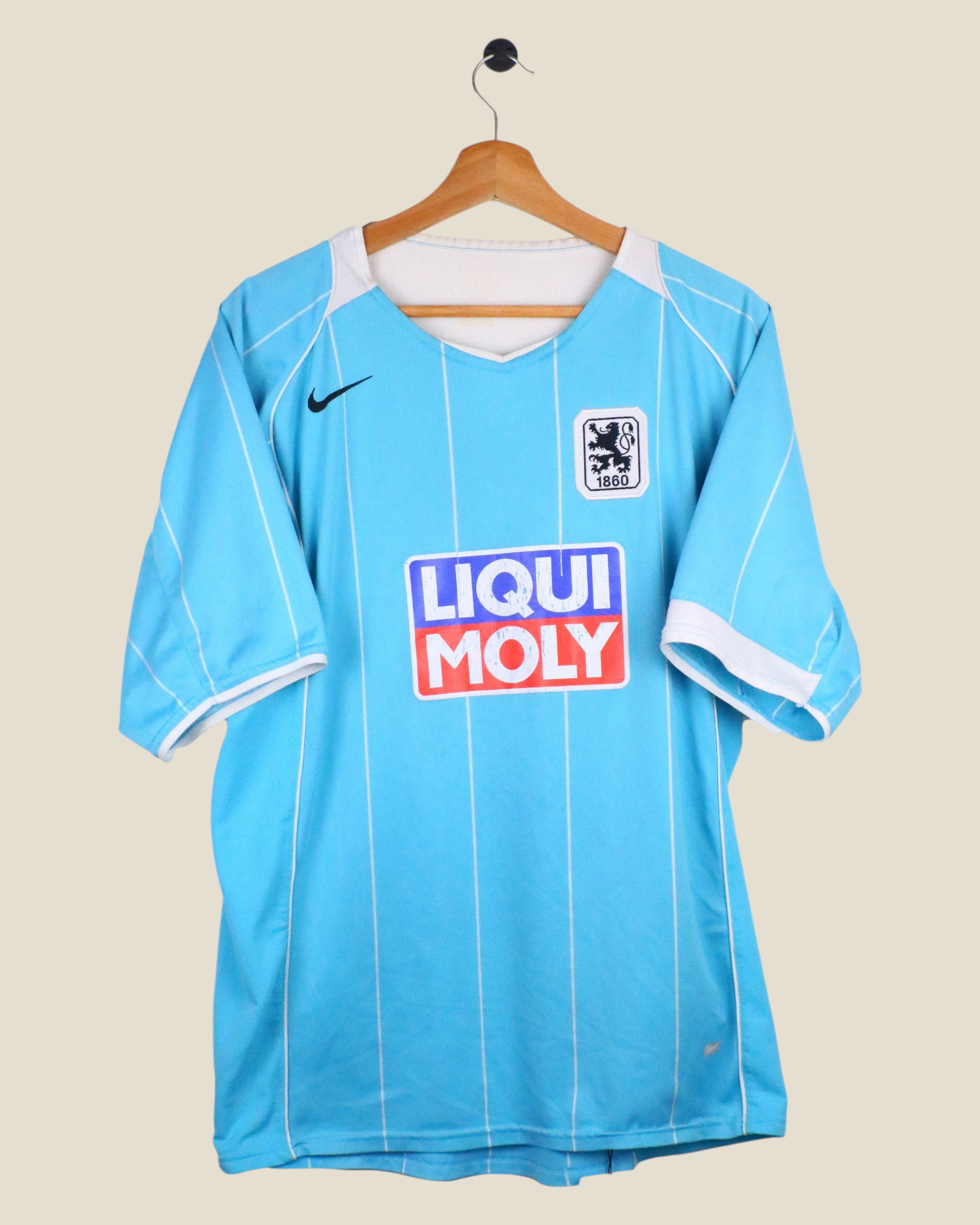 Kick Off Vintage 1860 Munchen 2004/05 home football shirt in light blue with white pinstripes and Liqui Moly sponsor.