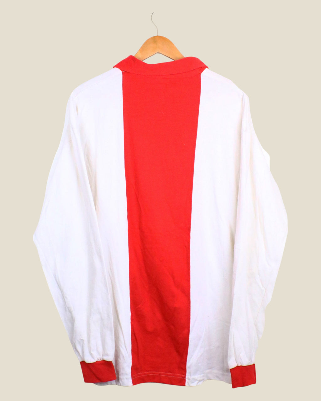Kick Off Vintage Ajax 1999/00 centenary long sleeve football shirt in white and red, back view on a wooden hanger.