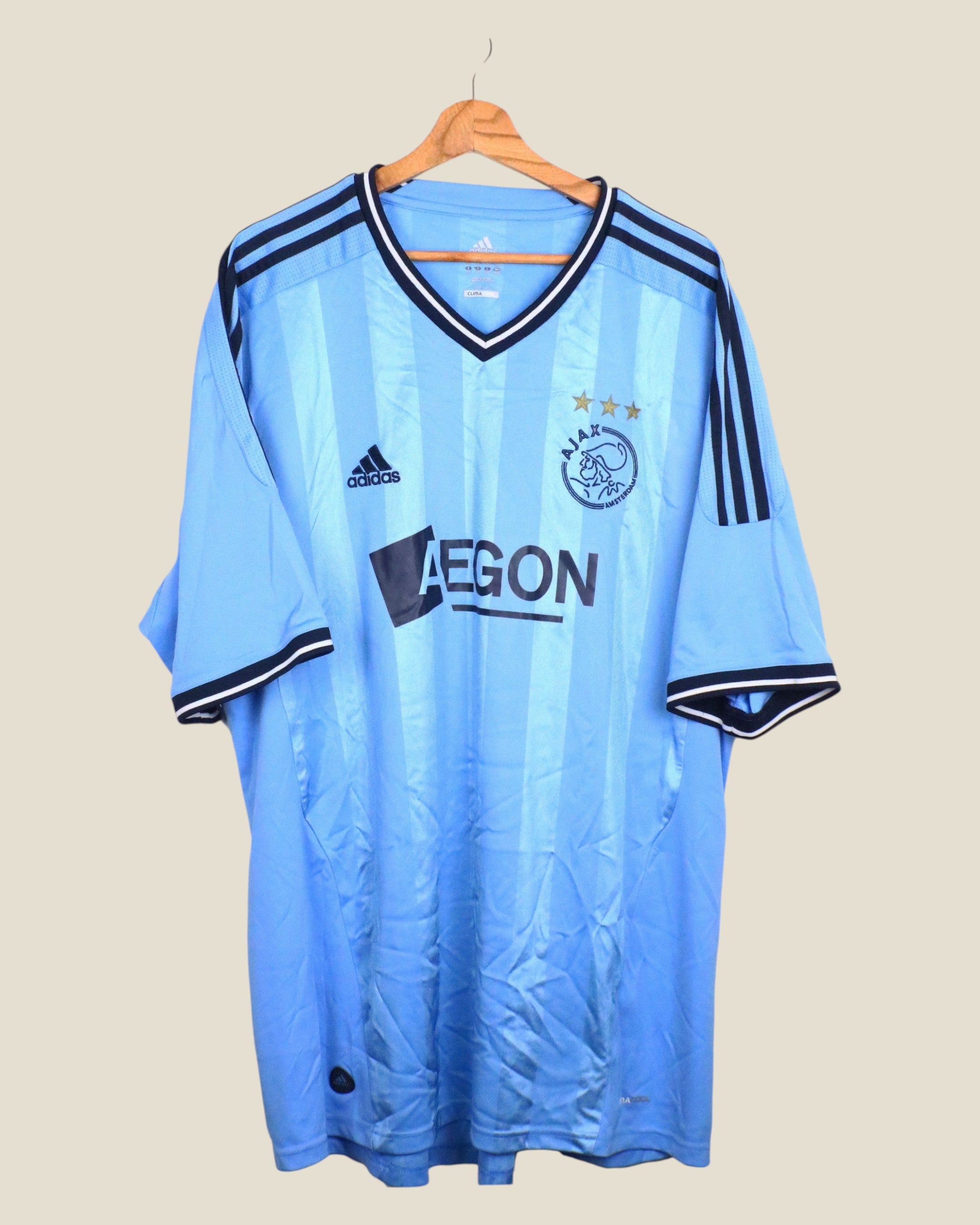 Kick Off Vintage 2011/12 Ajax away football shirt in light blue with black Adidas stripes and Aegon sponsor logo
