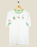 Kick Off Vintage Algeria 2014 home football shirt in white with green trim, Puma logo, and team crest on a hanger.