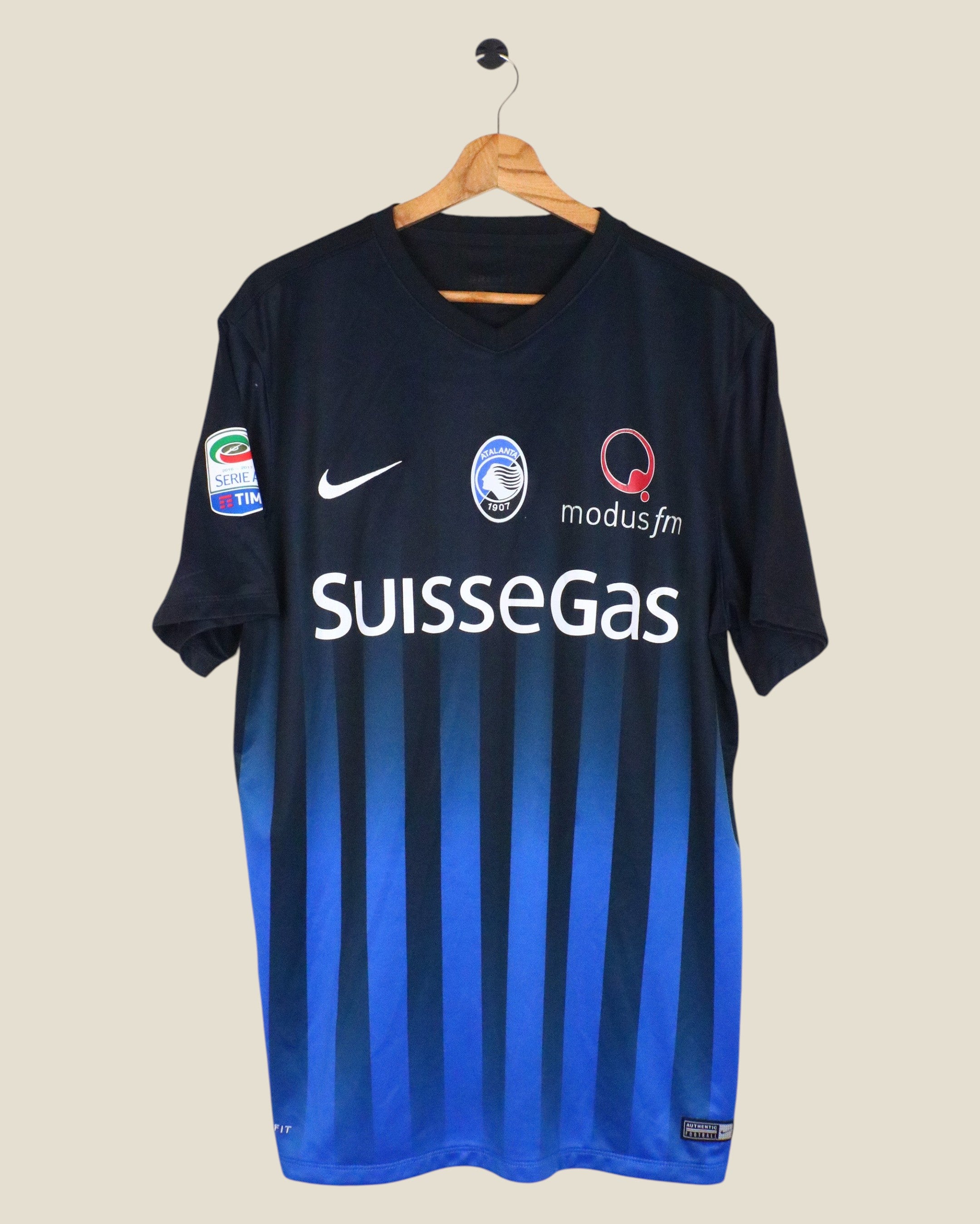 Kick Off Vintage Atalanta 2016/17 home jersey featuring Papu Gomez, black and blue stripes with Nike branding.
