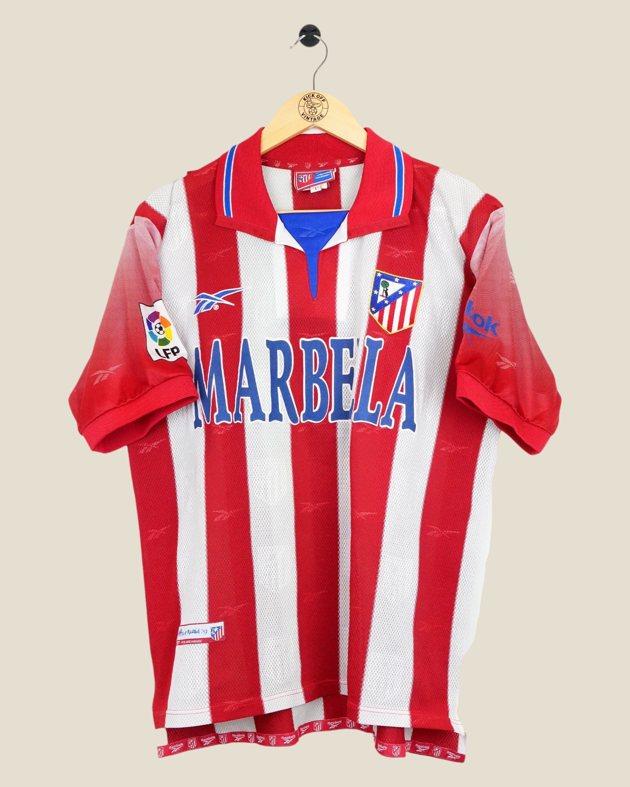 Kick Off Vintage Atletico Madrid 1998/99 home football shirt in red and white stripes with Reebok branding.
