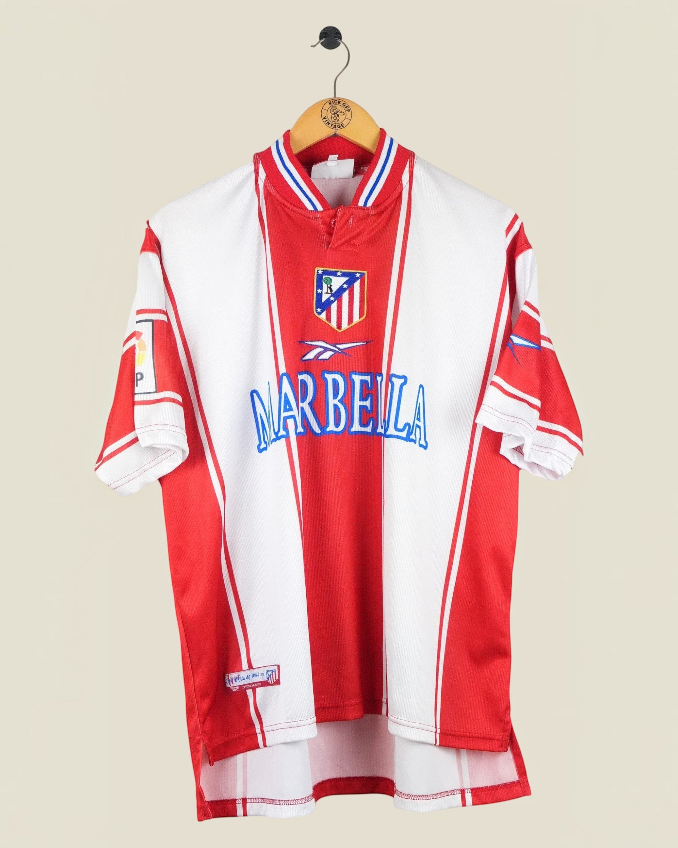 Kick Off Vintage 1999/00 Atletico Madrid home football shirt in red and white with Reebok branding and Marbella sponsor