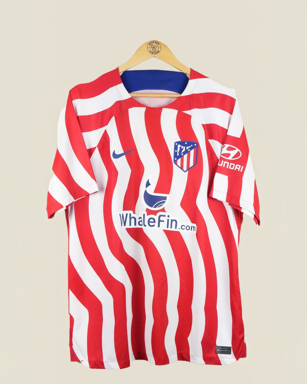 Kick Off Vintage Atletico Madrid 2022/23 Joao Felix home jersey in red and white stripes with Nike branding
