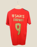 Kick Off Vintage Benfica 2020/21 home jersey with Nunez #9 print in red and gold, hanging on a wooden hanger.