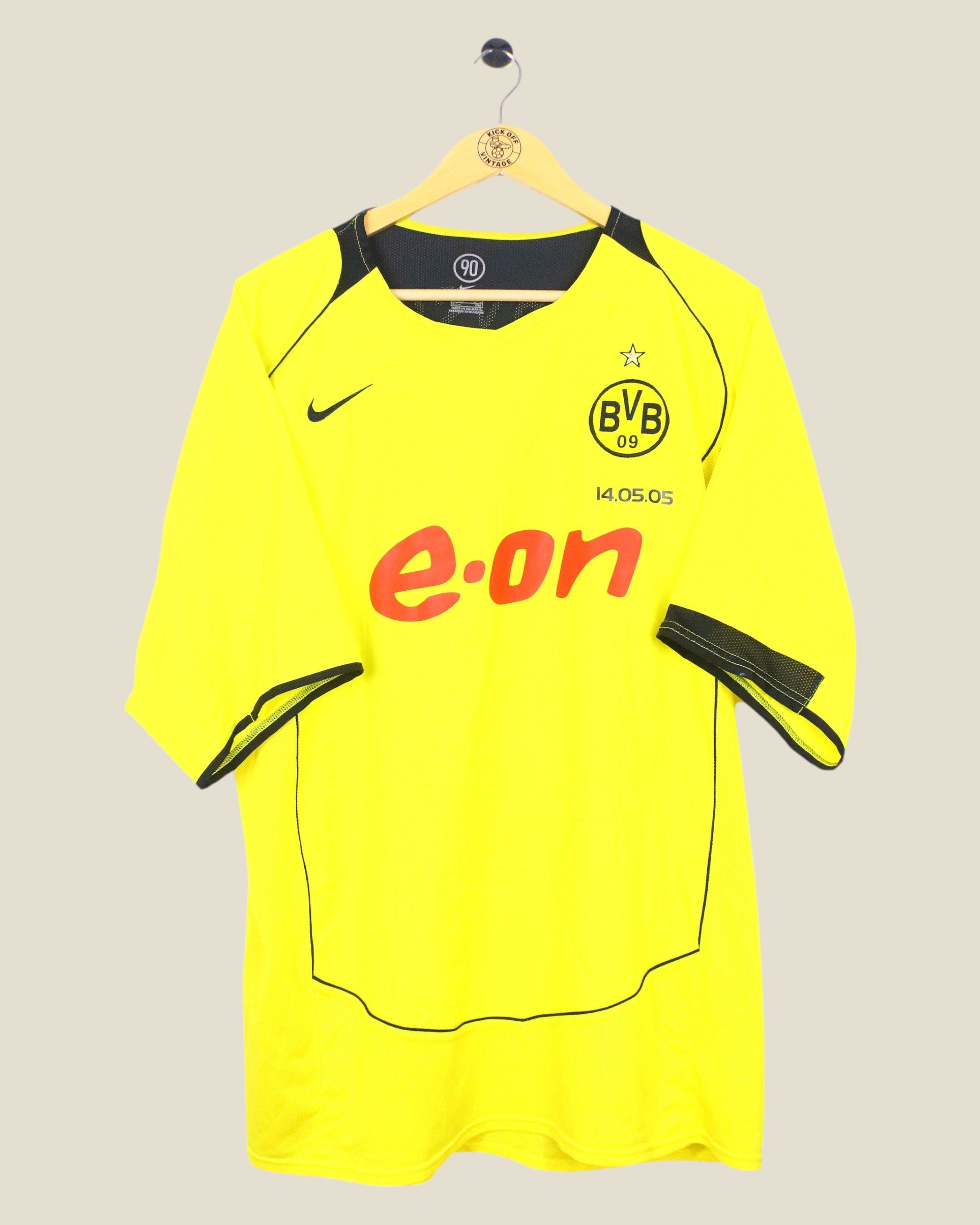 Kick Off Vintage Borussia Dortmund 2004/05 Nike home shirt in yellow with black trim and E.ON sponsor logo