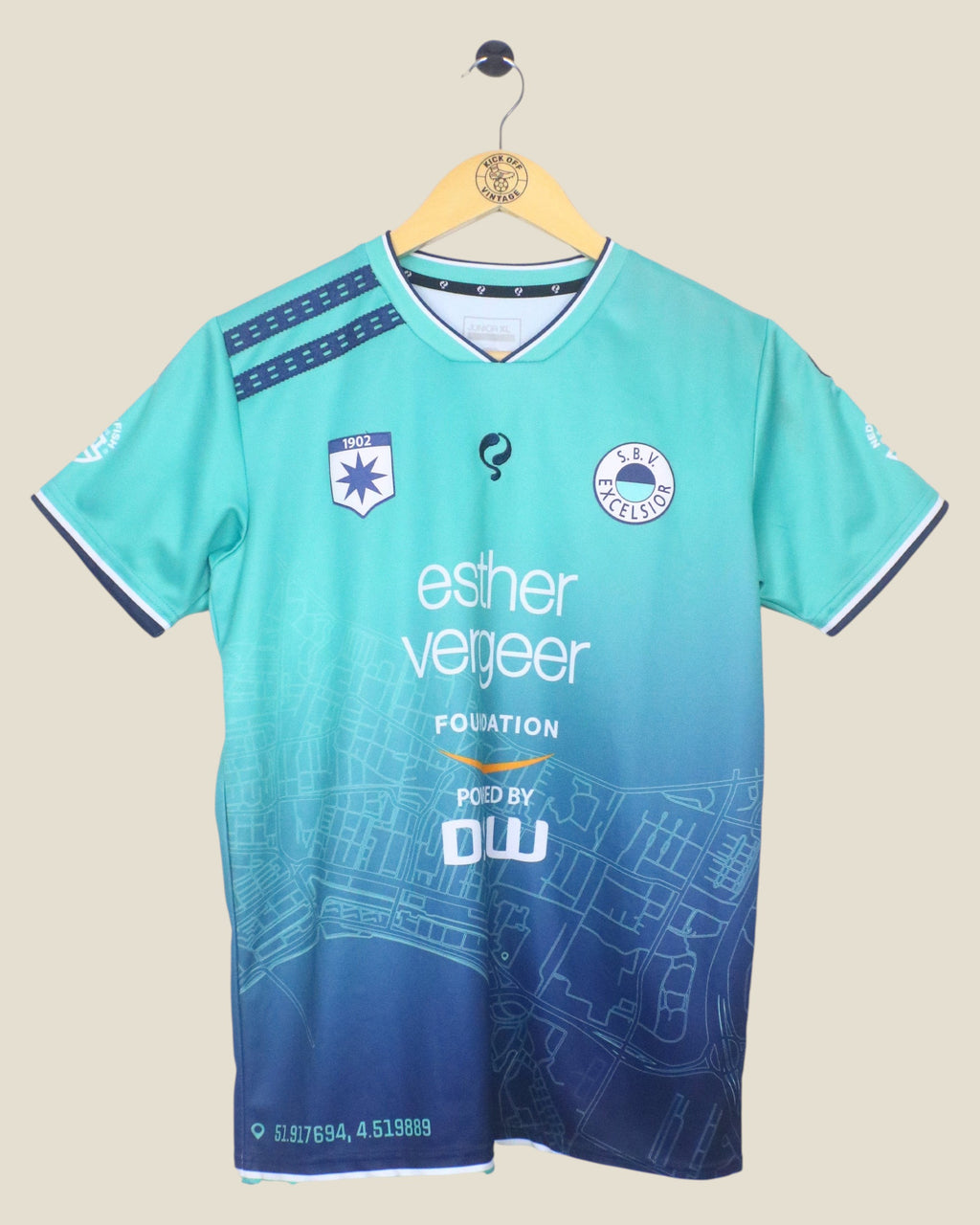 Kick Off Vintage Excelsior 2019/20 away football shirt in teal and blue gradient with map graphic and sponsor logos.