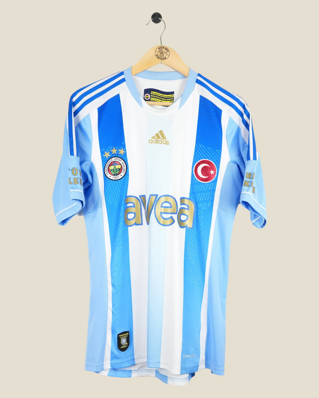Kick Off Vintage Fenerbahce 2011/12 away football shirt in light blue and white stripes with gold Adidas branding.