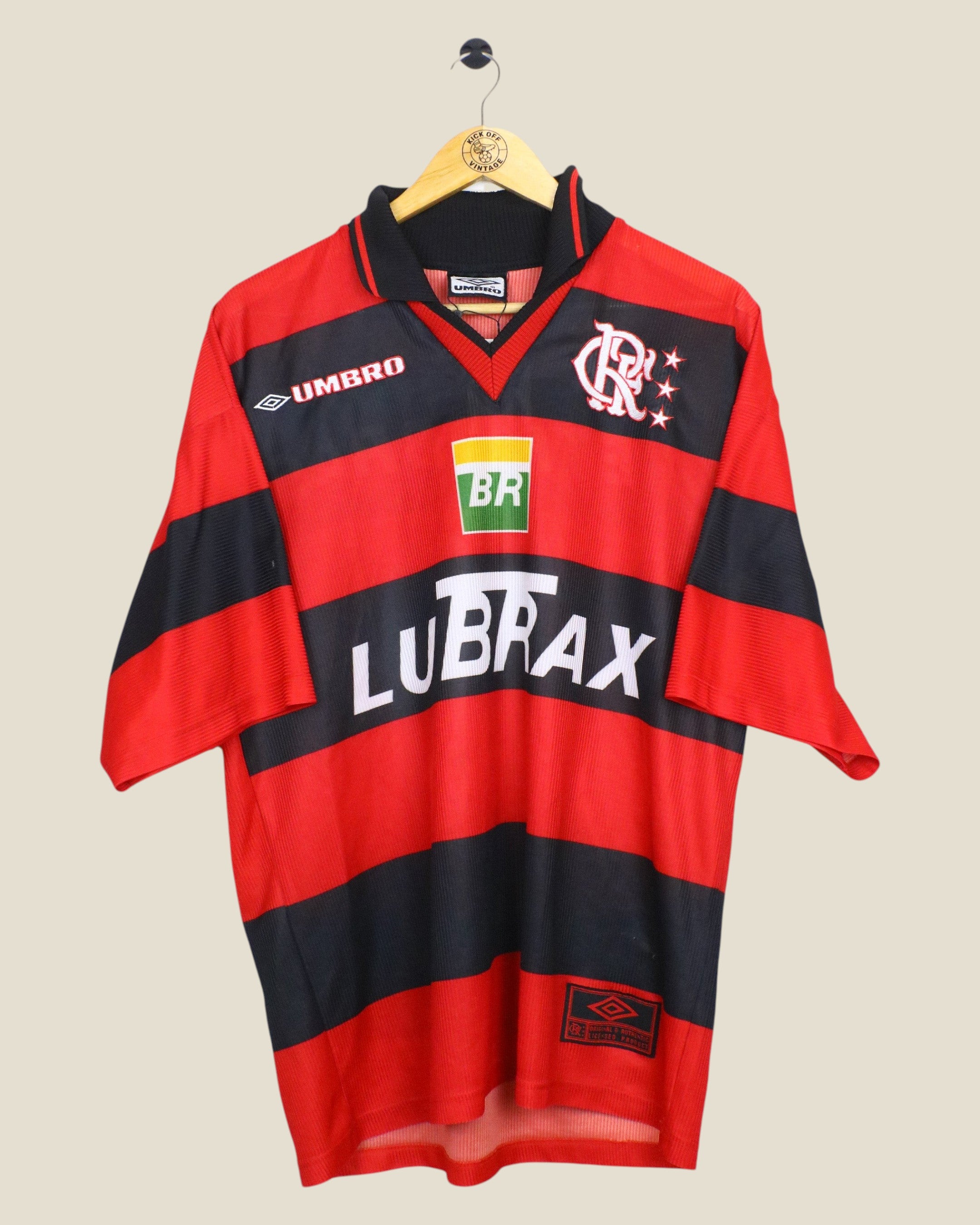 Kick Off Vintage 1999 Flamengo home football shirt with number 10, featuring red and black stripes and Umbro branding.