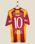Kick Off Vintage Galatasaray 2010/11 Arda Turan home shirt with number 10 in red and yellow striped design