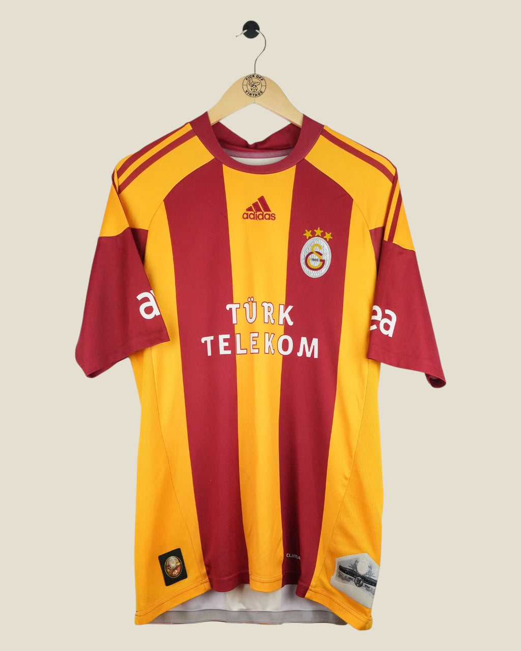 Kick Off Vintage Galatasaray 2010/11 home football shirt in red and yellow with Arda Turan player details