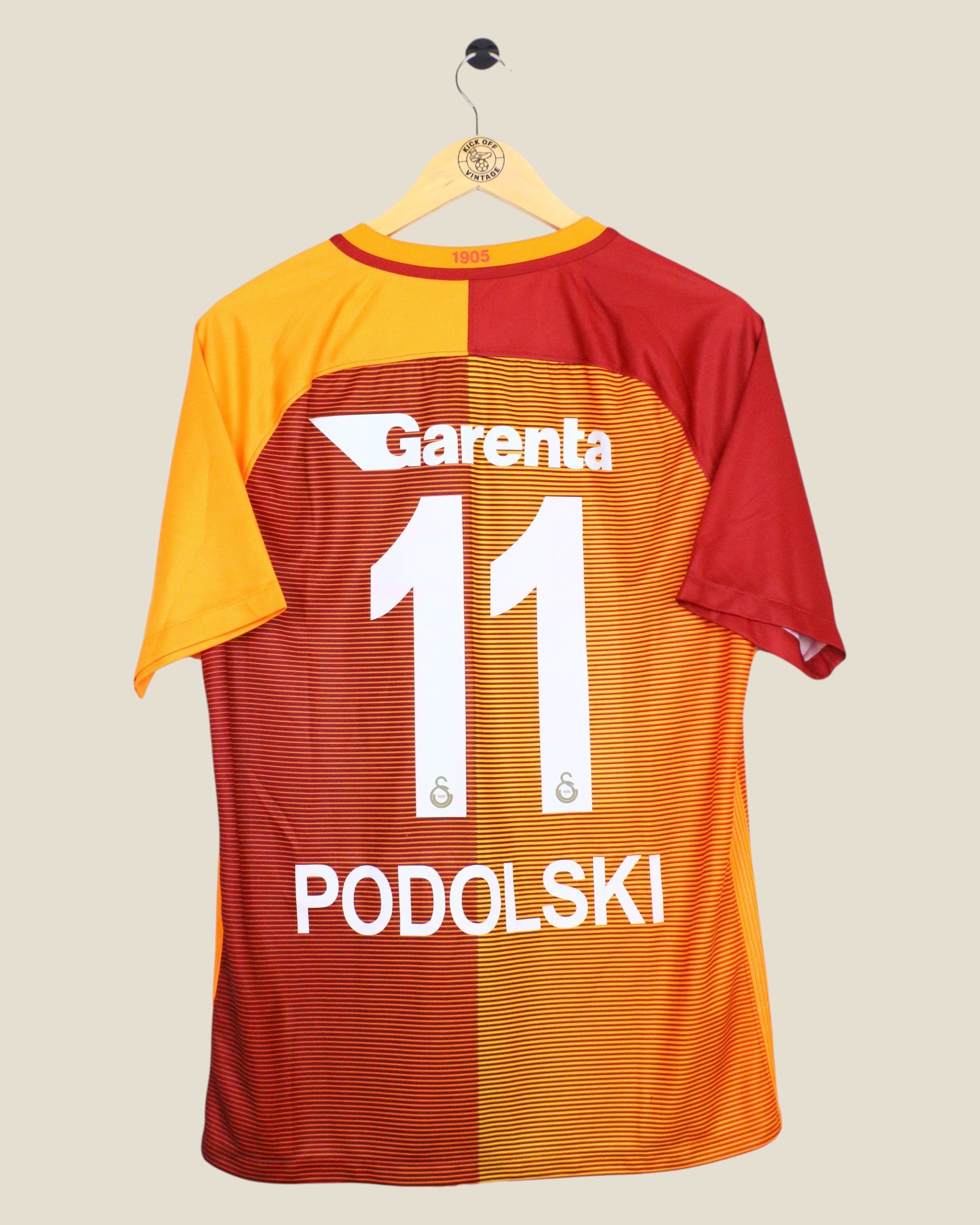 Kick Off Vintage Galatasaray 2016/17 home jersey featuring Podolski number 11 in red and yellow with Garenta sponsor