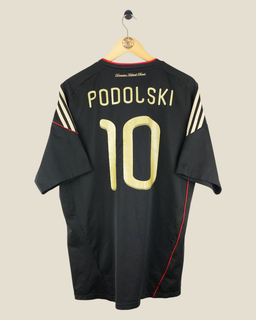 Kick Off Vintage Germany 2010 Podolski away football jersey in black with gold name and number 10 on the back