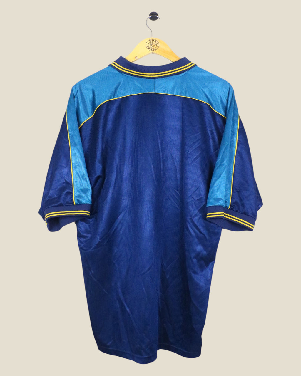 Back view of a vintage 1999/00 Huddersfield Town football shirt by Mitre in blue with yellow trim from Kick Off Vintage
