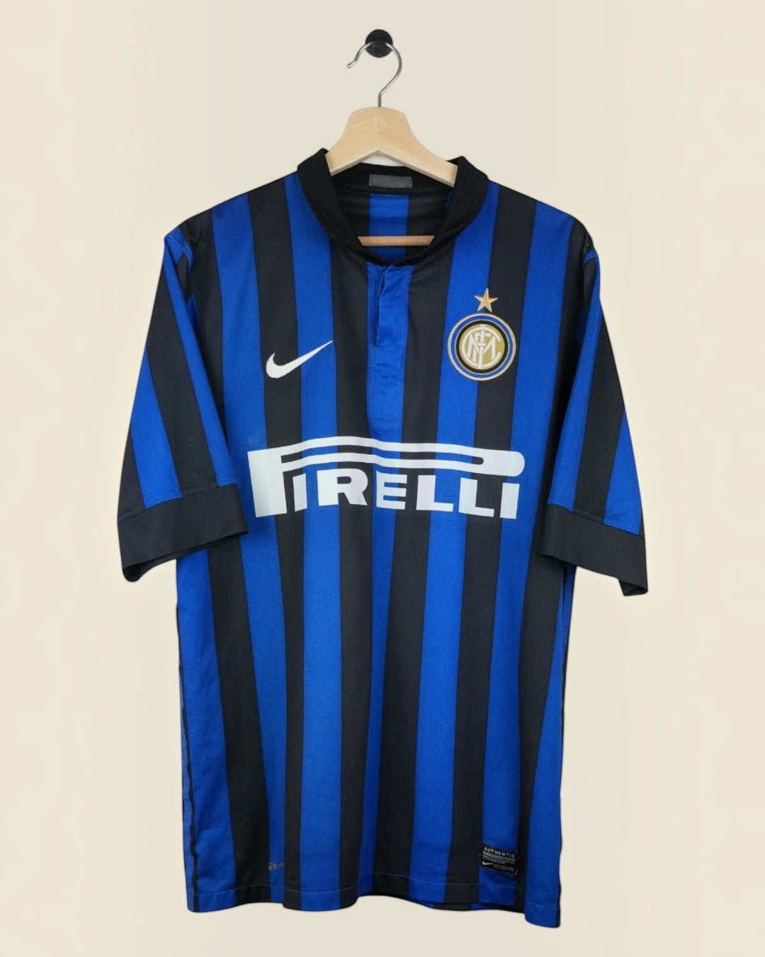 Kick Off Vintage Inter Milan 2011/12 home jersey by Nike featuring blue and black stripes and Pirelli sponsor logo