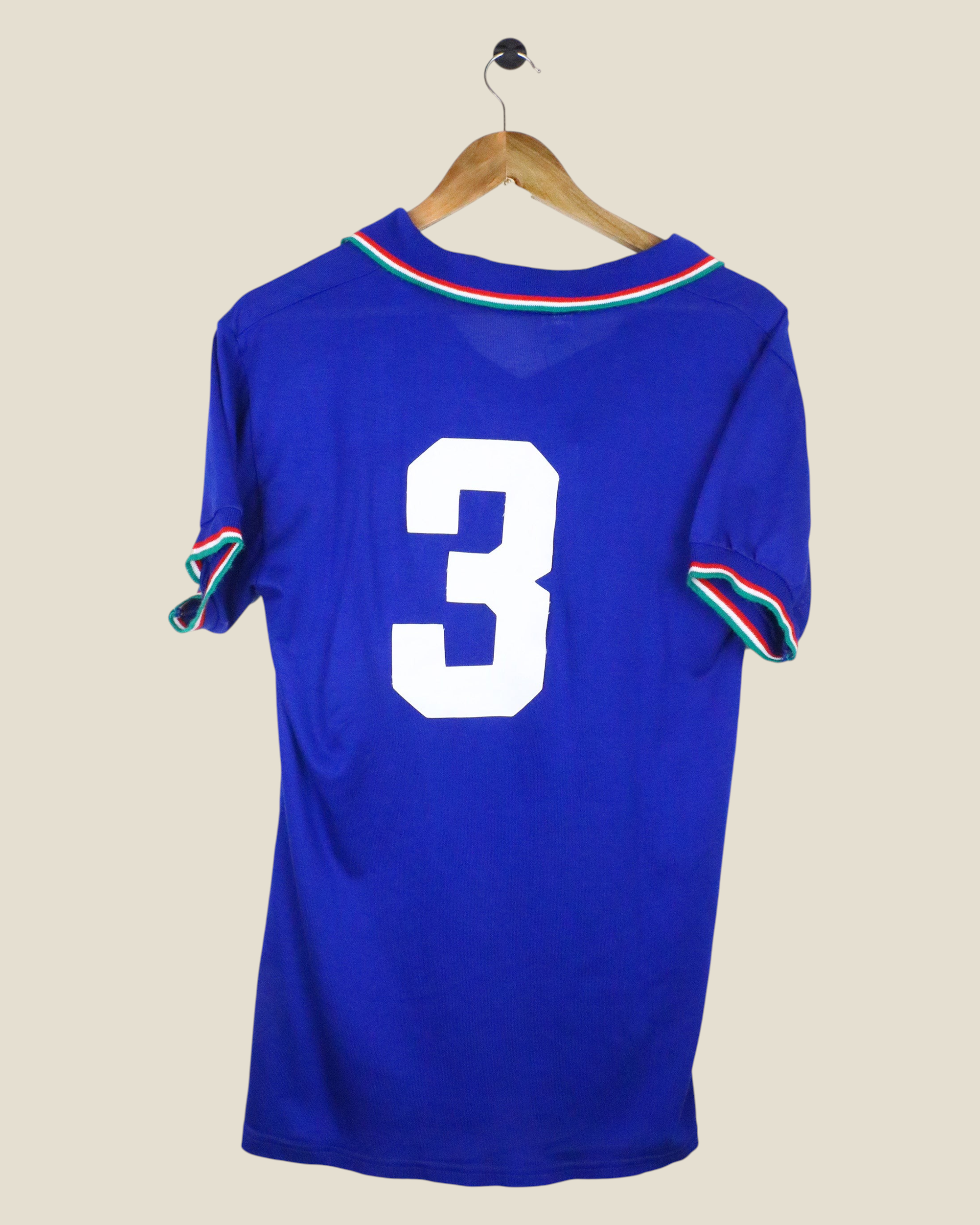 Back view of a vintage 1990 Italy home football jersey by Kick Off Vintage featuring number 3 in white on blue fabric