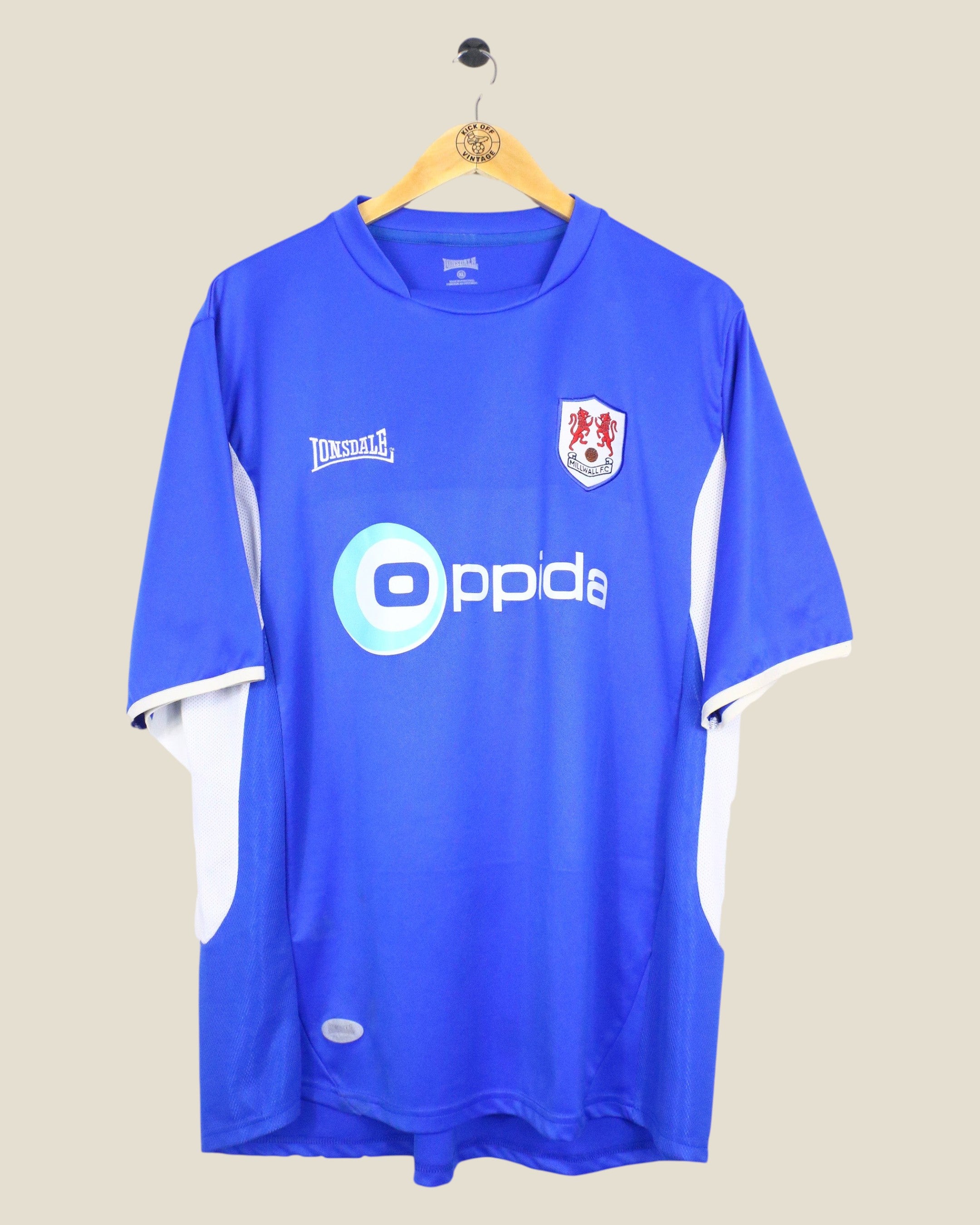 Kick Off Vintage Millwall 2006/07 home football shirt in blue with white accents, Lonsdale branding, and Oppida sponsor