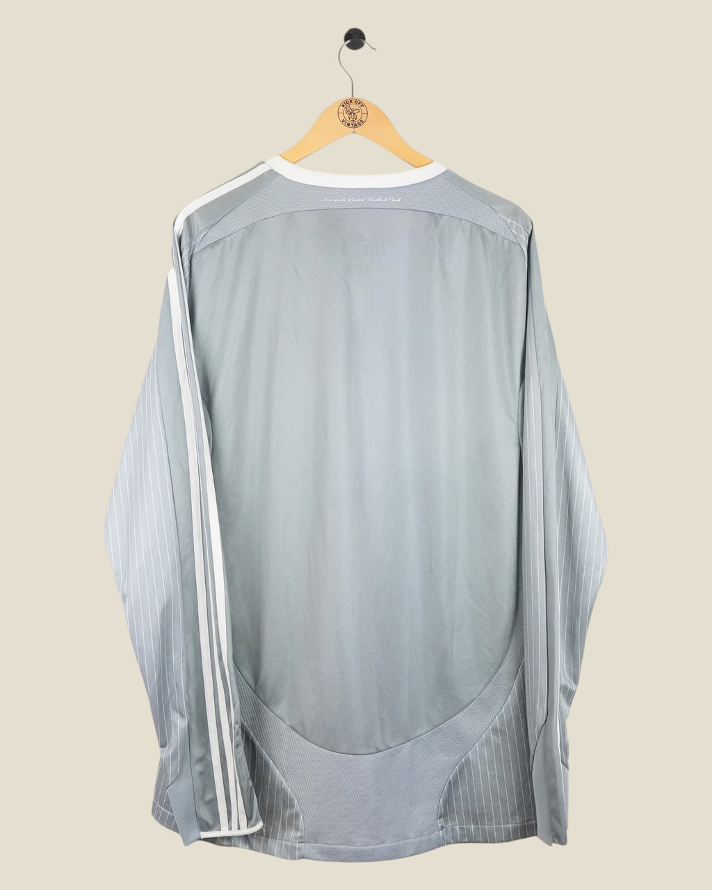 Back view of a grey Kick Off Vintage Newcastle United 2008/09 long sleeve third football shirt by Adidas