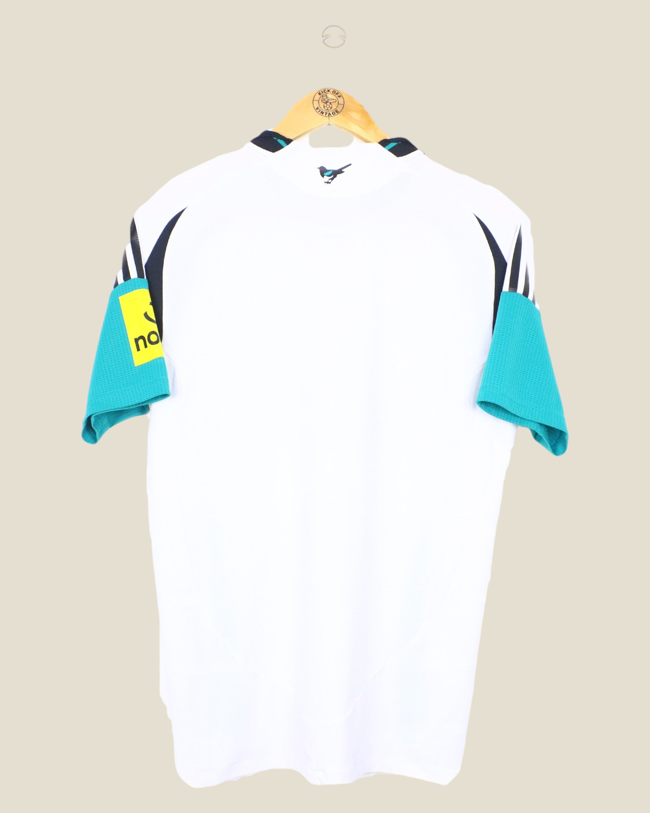 Back view of Kick Off Vintage Newcastle United 2024/25 third player version shirt in white with teal sleeves