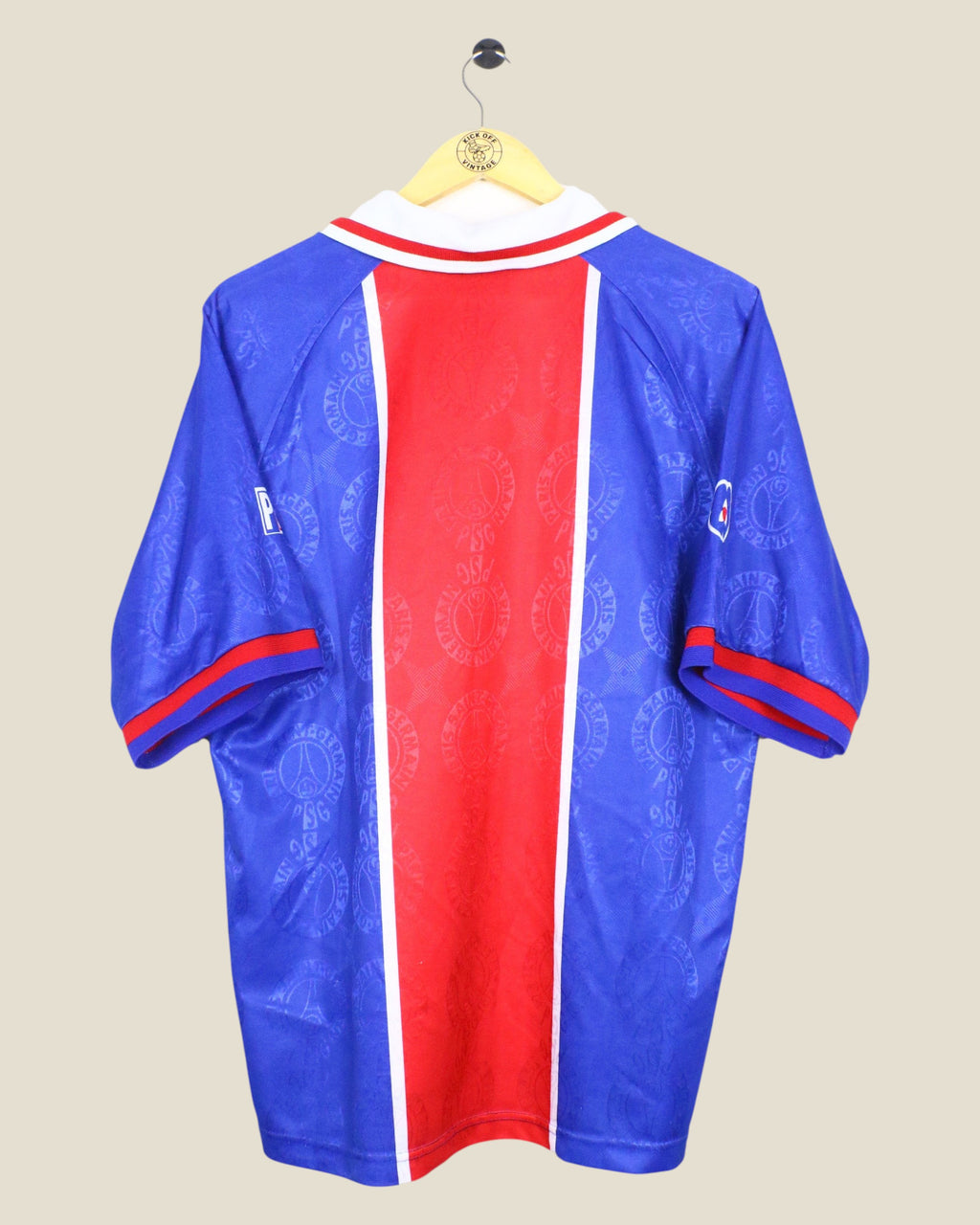 Back view of a vintage Kick Off Vintage Paris Saint-Germain 1996/97 home football shirt in blue and red.