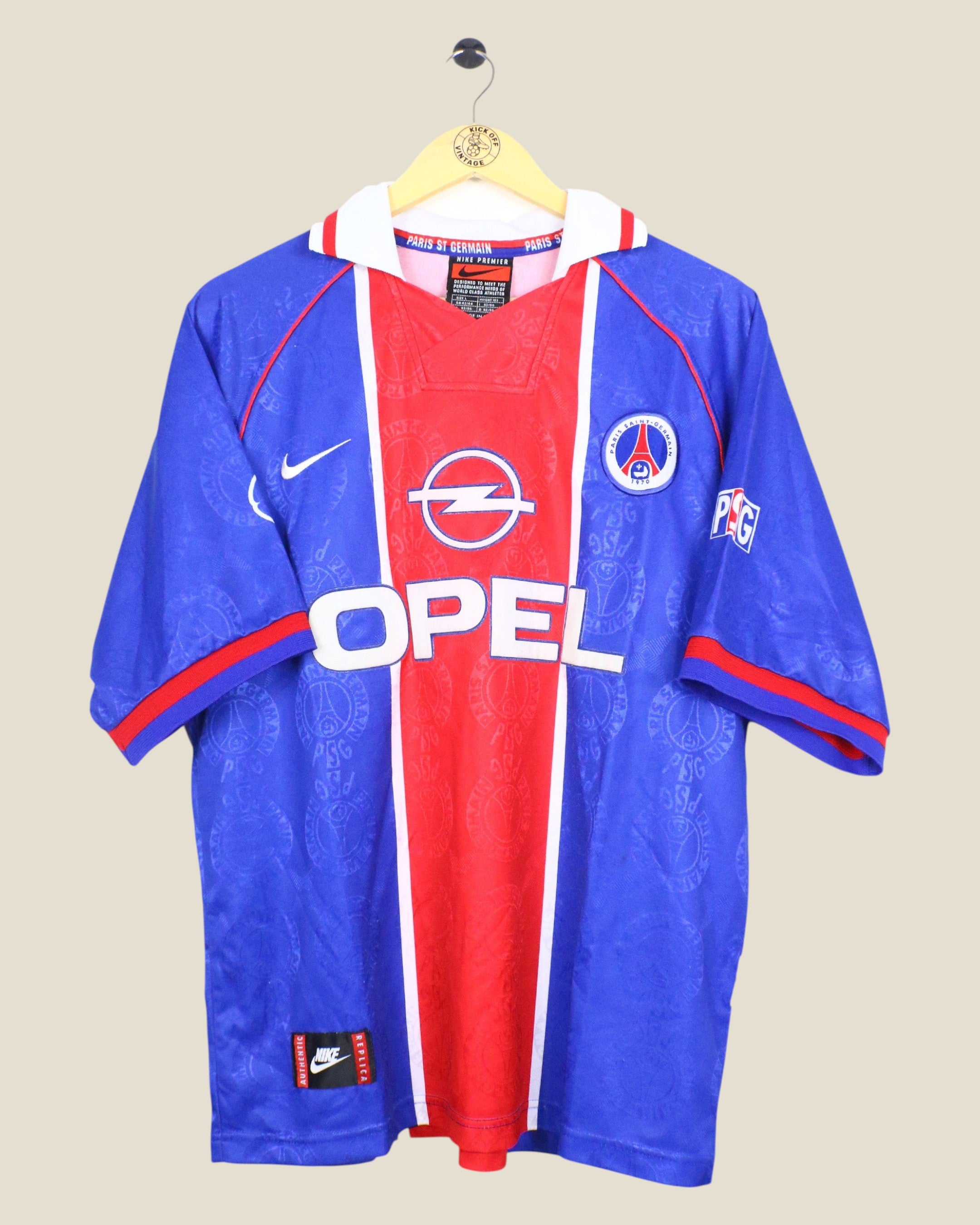 Kick Off Vintage 1996/97 Paris Saint-Germain home football shirt by Nike in blue and red with Opel sponsor logo.