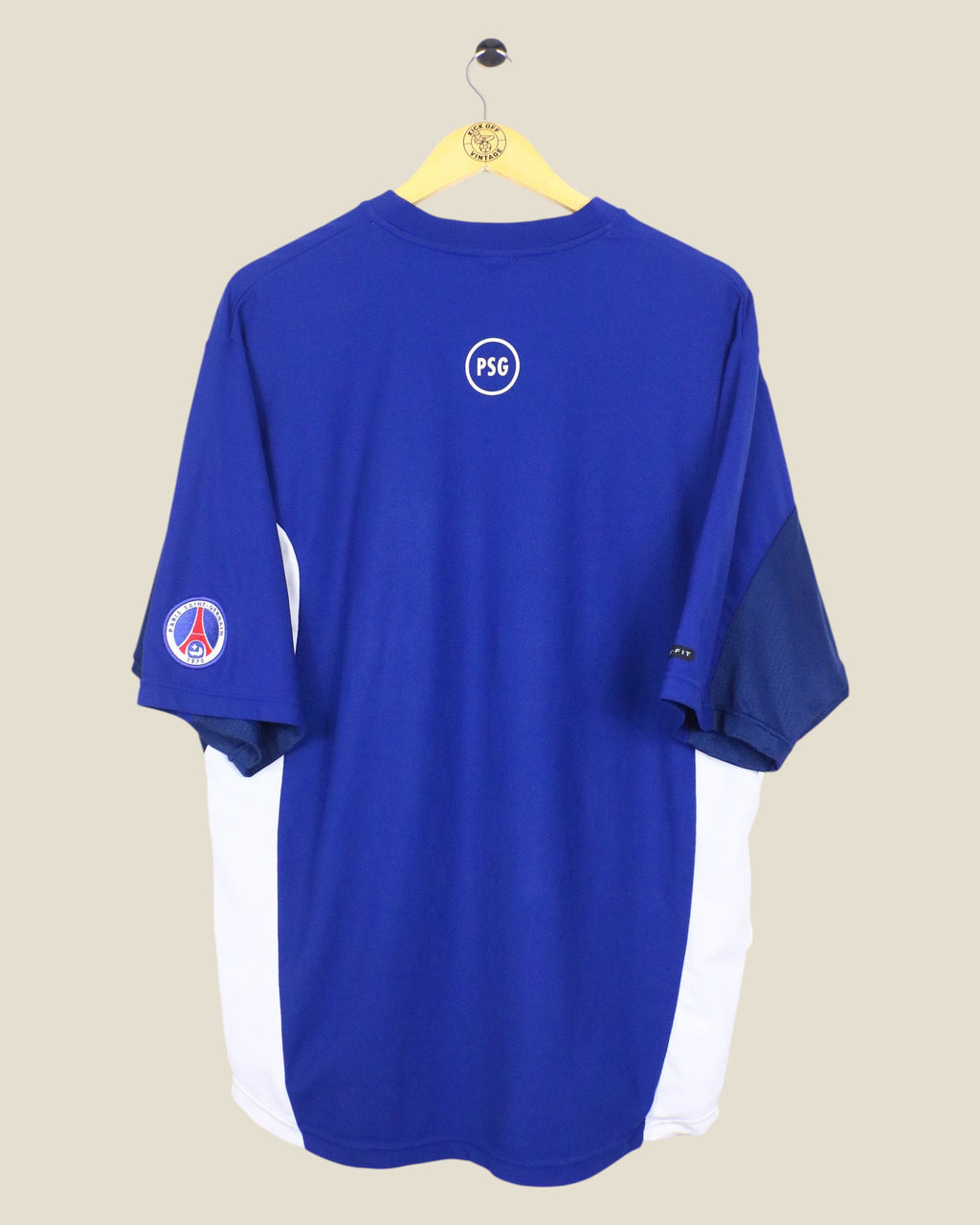 Kick Off Vintage Paris Saint-Germain 2000/01 blue training shirt with white side panels and PSG logo on back