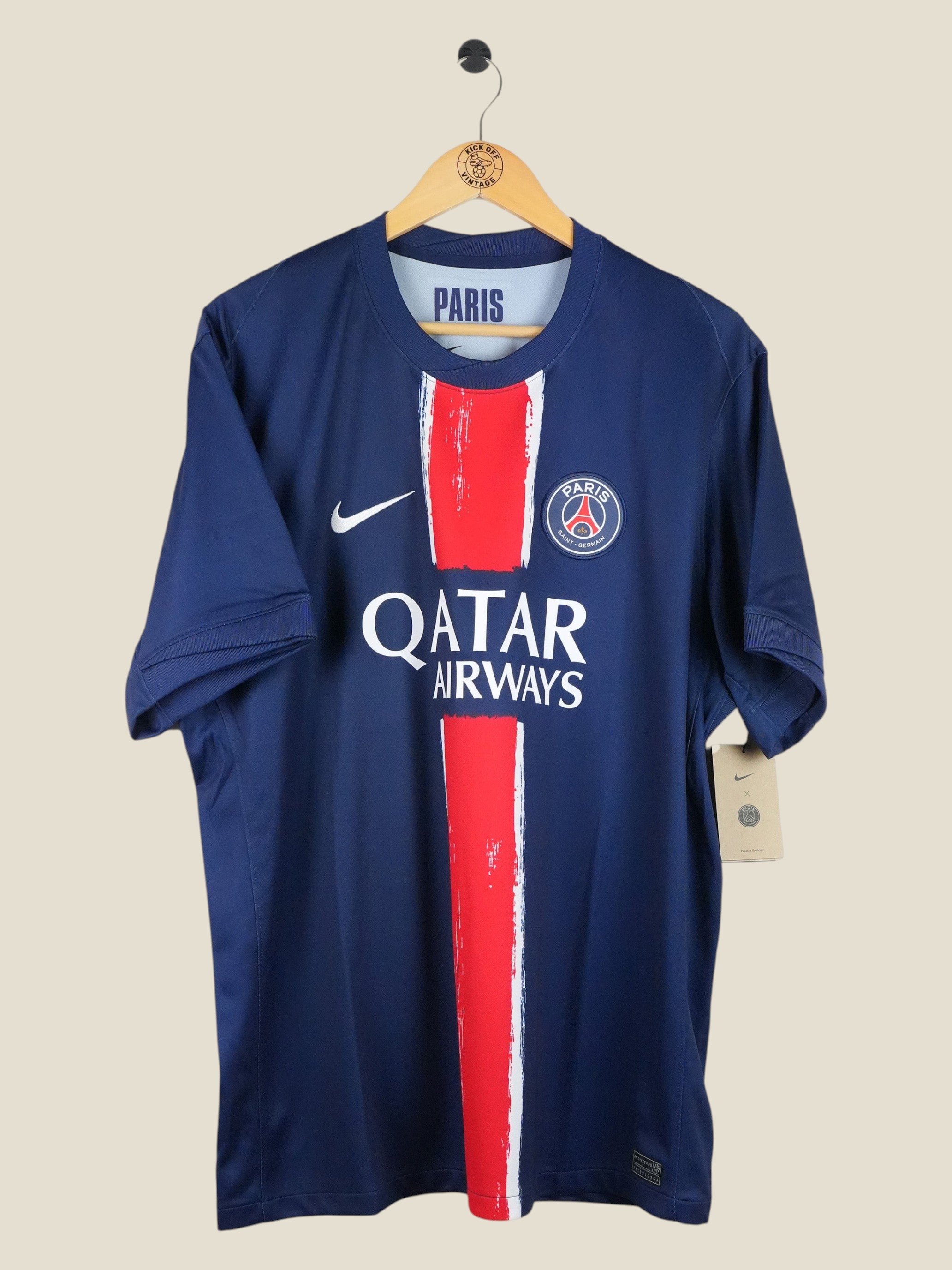 Kick Off Vintage Paris Saint-Germain 2024/25 Hakimi home jersey in navy blue with red center stripe and Nike logo.
