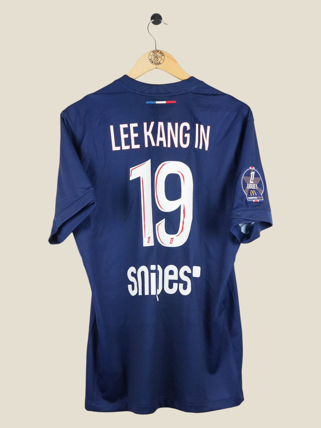 Kick Off Vintage Paris Saint-Germain 2024/25 Lee Kang In home jersey with number 19 and Ligue 1 patch on back