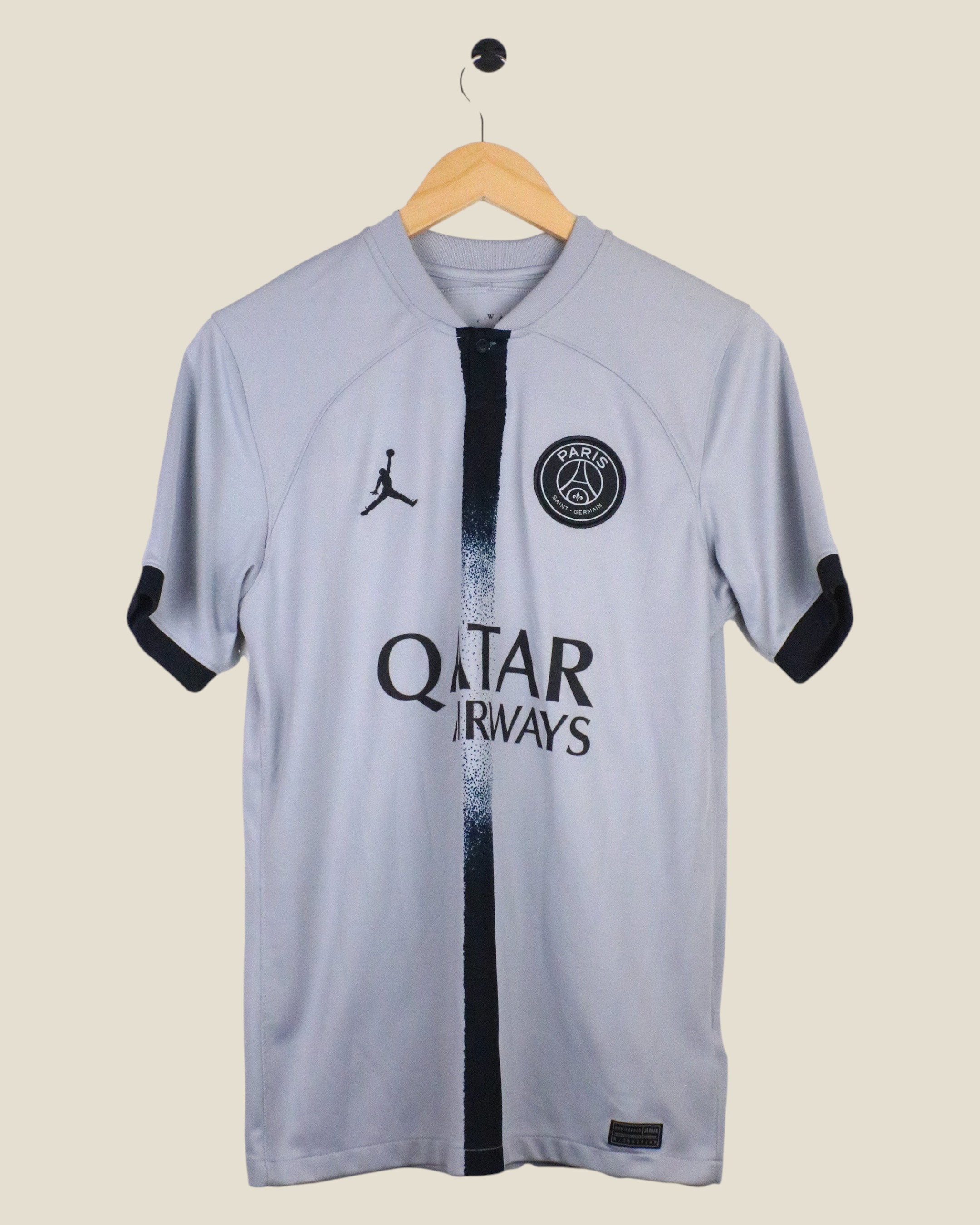Kick Off Vintage Paris Saint-Germain 2022/23 away jersey in grey with Mbappe #7, featuring Jordan branding.