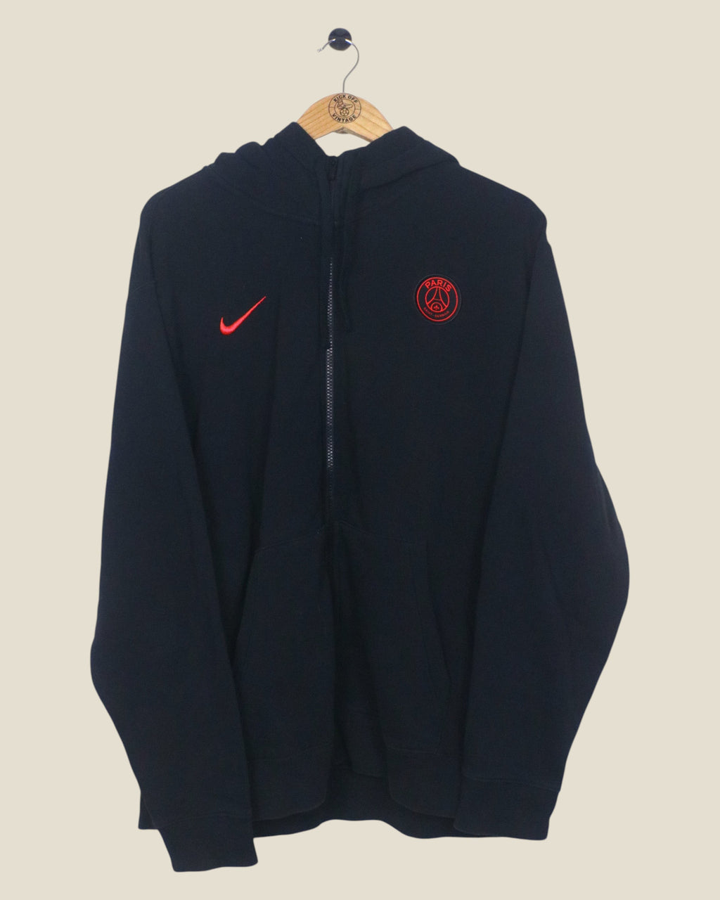 Kick Off Vintage 2021/22 Paris Saint Germain Nike zip-up hoodie in black with red logo and crest details.