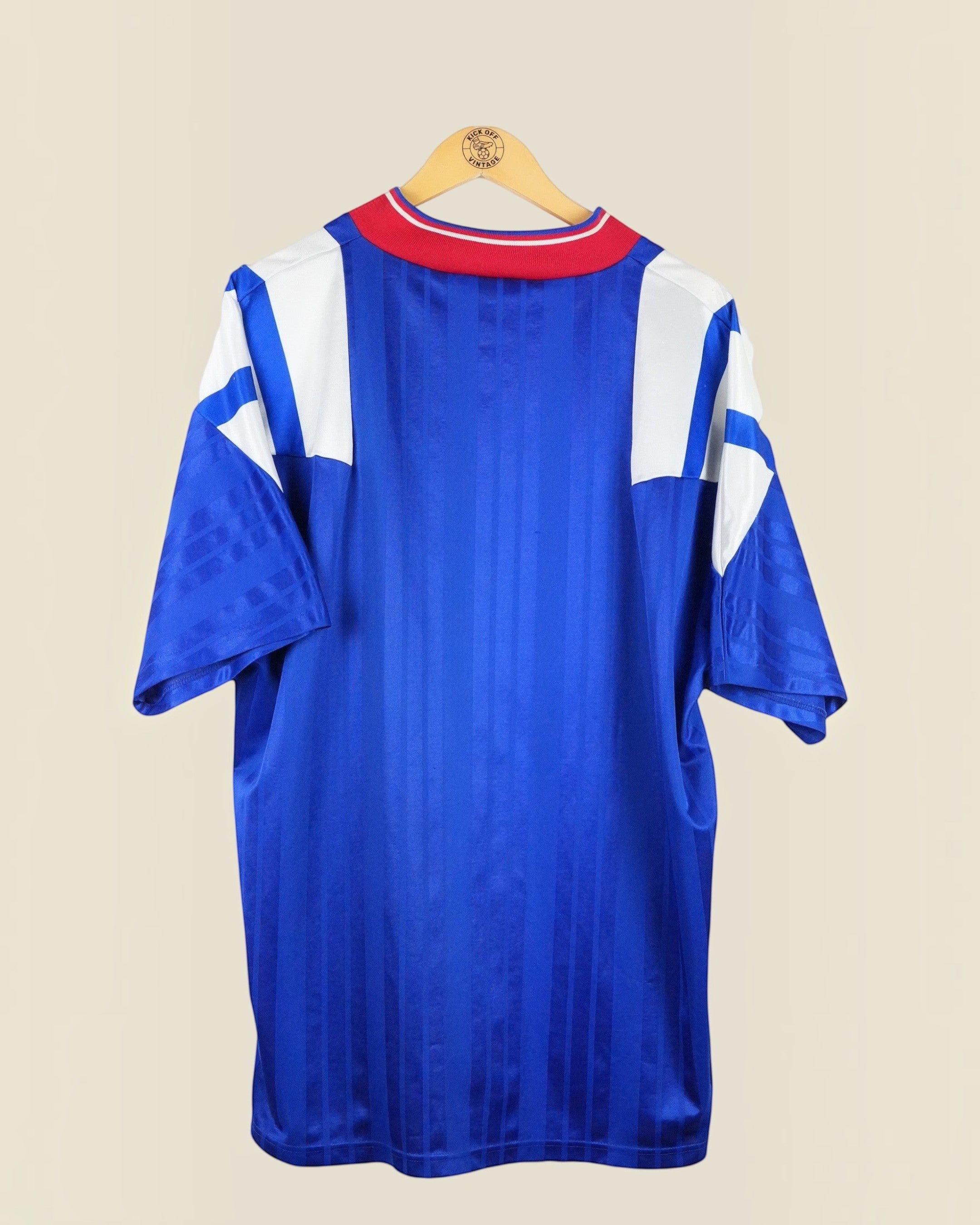 Kick Off Vintage Rangers 1992/93 home football shirt in blue with white and red collar details, back view.