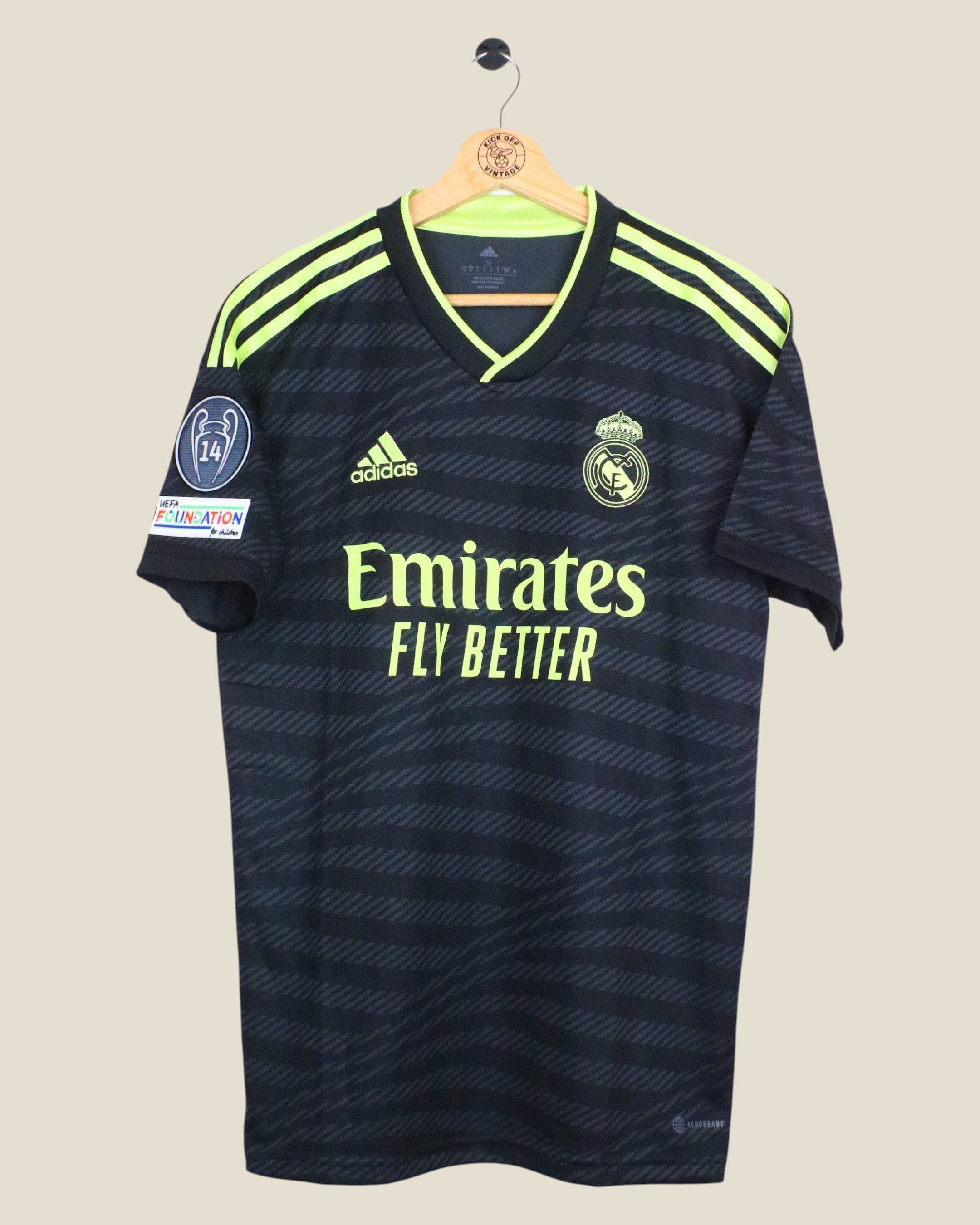 Kick Off Vintage Real Madrid 2022/23 third jersey in black with neon yellow accents and UCL sleeve patches